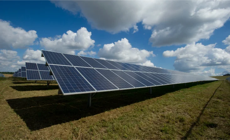 A symmetrical solar panel array on a commercial building